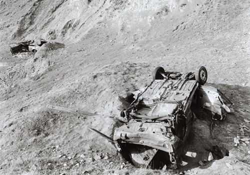 Wrecked cars Titterstone Clee from Quarry Land